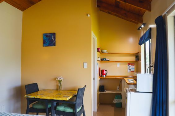 Tourist Flat - dining table and kitchenette